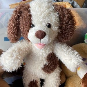 White and brown build a bear puppy